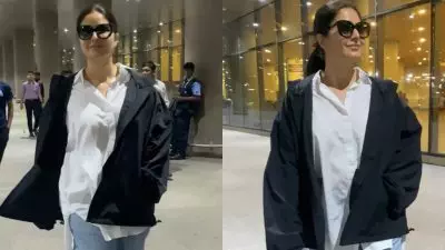 Katrina Kaif Tampil Fashionable di Bandara Dengan Atasan Putih, Jaket Hitam, dan Sepatu Converse